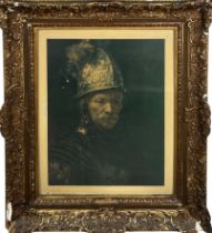 A PRINT AFTER REMBRANDT MOUNTED IN GILTWOOD FRAME