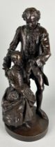 A LARGE BRONZE SCULPTURE OF MOZART TEACHING A GIRL, 50cm x 20cm