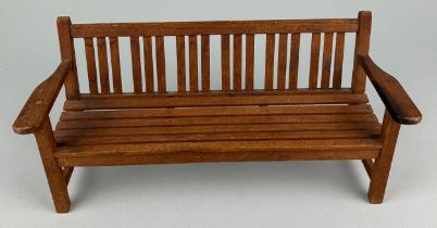 AN APPRENTICE MODEL OF A GARDEN BENCH, 20TH CENTURY