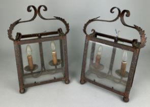 A PAIR OF ORNATE ANTIQUE CAST METAL WALL LANTERNS, 48cm h x 33cm w (each) Used condition, due to age