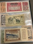 An extensive album of world banknotes