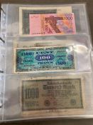 An album of world banknotes from the Arctic Territories to Zambia