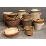 A selection of stoneware pots, possibly French