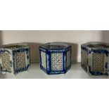 Seven blue and white hexagonal Chinese candle lanterns