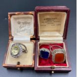 A selection of three quality costume jewellery rings and a silver wedding band