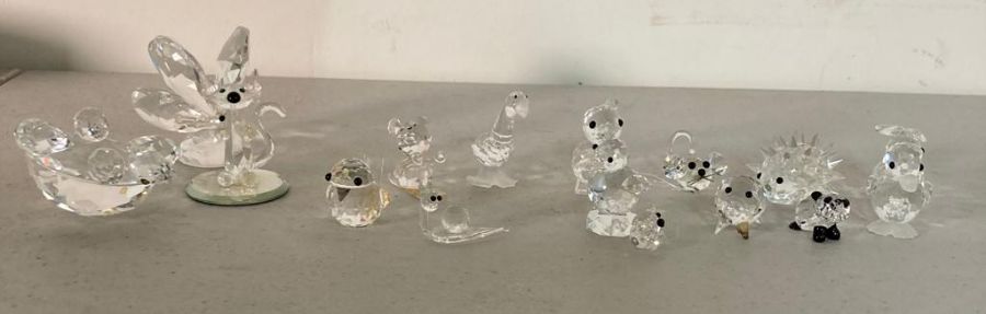 A selection of Swarovski crystal animals to include hedgehog, panda and a snail