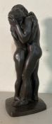 A small Heredities statue of Adam and Eve in an embrace (H33cm)