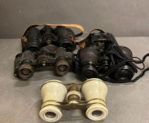 A selection of vintage binoculars and opera glasses