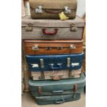 Seven vintage suitcases, ideal display or props