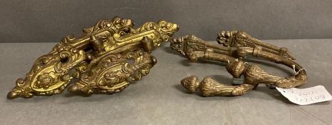 Two pairs of gilt bronze curtain tie backs in the rococo style