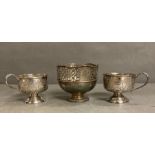 Two silver plated cups and a silver plate pierced bowl