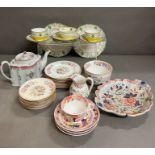 A mixed selection of porcelain tea cups, saucers and plates, various makers