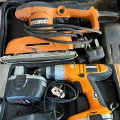 Two power tools, drill and a sander