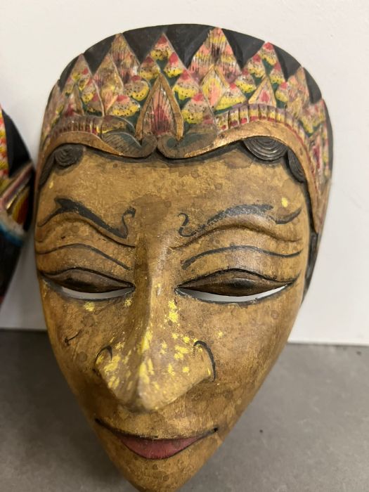 A pair of painted wooden masks, Indonesian in style - Image 3 of 4