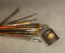 A vintage B Smith of Hampstead tin paint brush holder with brushes