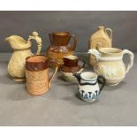A selection of stoneware jugs and mug, one stamped Bailey and Co Fulham along with a Staffordshire
