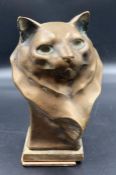 A signed bronze of a cat
