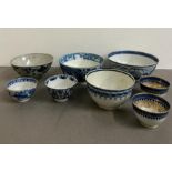 A selection of blue and white bowls, various ages and patterns