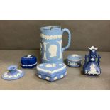 A selection of Wedgewood Jasper Ware to include a jug, vase and pin pots