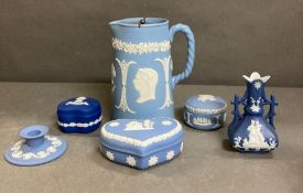 A selection of Wedgewood Jasper Ware to include a jug, vase and pin pots
