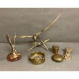 A selection of brass items to include birds and a French ashtray