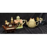 A selection of four novelty teapots