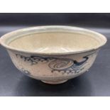 An antique Chinese white and blue bowl