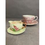 A Carlton ware jug along with a Mygott "The Hunter" tea cup and saucer