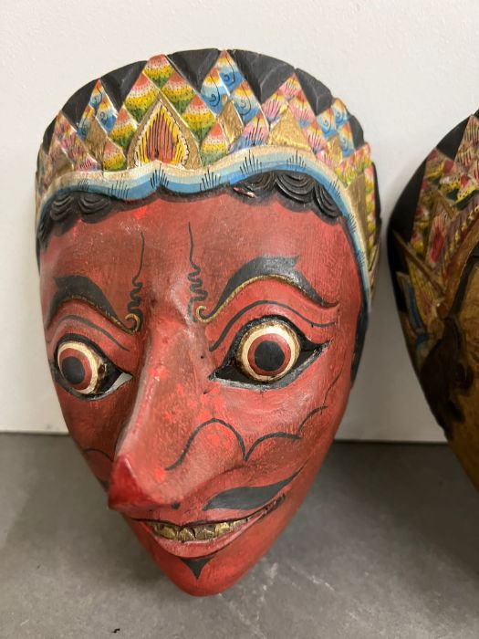 A pair of painted wooden masks, Indonesian in style - Image 2 of 4