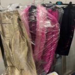 A selection of designer women's suits and separates including Moschino Armani, Christian Lagroix