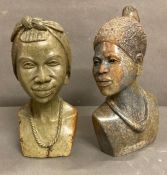 Two African stone portrait sculptures of tribal women