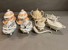 A selection of various design of sauce boats and pots