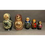 A selection of five sets of Russian dolls