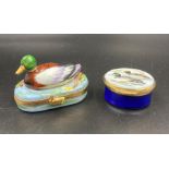 Two duck themed pill boxes