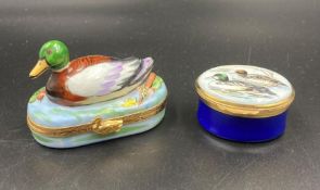 Two duck themed pill boxes