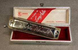 The Larry Adler Professional twelve harmonica by Hones, boxed