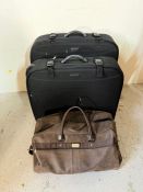 Two antler suitcases and a selection of hand luggage
