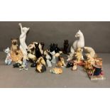 An extensive selection of ceramic and soap stone cats