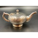 A silver plated bachelor teapot marked Fraget W Warszawie to base.