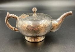 A silver plated bachelor teapot marked Fraget W Warszawie to base.