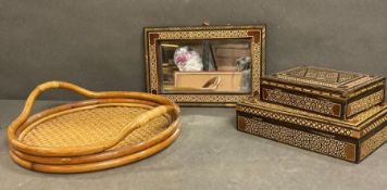 Two vintage Moroccan inlaid boxes and a mirror and a wicker tray