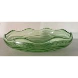 A vintage green depression glass salad bowl