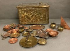 A selection of brass and copper items to include pin trays, bowls, plates and a coal scuttle