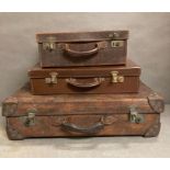 Three Vintage brown leather suitcases