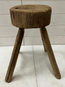 A rustic wooden stool on four legs (H47cm Dia28cm)