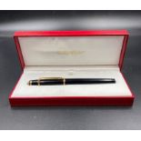 A Cartier ballpoint pen, in original box