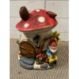 A garden gnome mushroom house, stamped to back (H34cm)