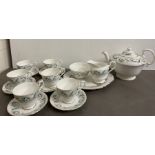 A Royal Standard china tea set "Garland", six cups and saucers, teapots, sugar bowls and milk jug