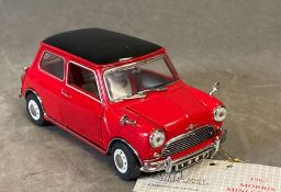 A Franklin Min Diecast model of a 1967 Morris Mini Cooper
