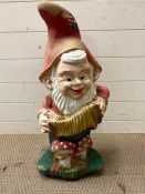 A garden gnome playing a squeeze box